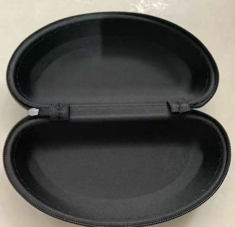 Open black hard shell sunglass pouch interior